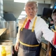 Donald J. Trump wearing an apron while dispensing french fries at a McDonald's fast food restaurant in Pennsylvania as part of a campaign stunt on Sunday, October 20, 2024. Photo by Doug Mills/AP.