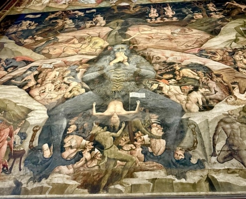 Last judgment by da Modea, Cathedral Bologna, IT. Shows tortured bodies and giant beast in the center eating the damned and shitting them out